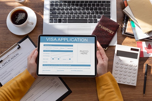 Canada Visa and Immigration Images/Photos: 3. Canada Online Visa Application Process (How to Apply Online). A representative photo of Canada visa application online with a tablet. Photo credit: Freepik. Prohttps://www.freepik.com/free-photo/visa-application-form-tablet_18895498.htm#