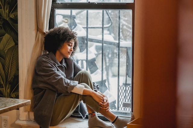 Sad Life Quotes Images/Photos: 2. Photo by Liza Summer: https://www.pexels.com/photo/melancholic-black-female-sitting-on-windowsill-6382594/