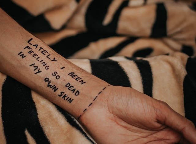 Sad Life Quotes Images/Photos: 3. A photo of feeling so dead in one's own skin tattoo sad illustration. Photo by Dollar Gill on Unsplash
