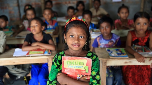 Education Levels in Bangladesh Images/Photos: 1. A girl posed for a photo in an elementary school education class in Bangladesh. Photo credit: World Bank. https://www.worldbank.org/en/news/feature/2019/07/08/a-second-chance-to-education