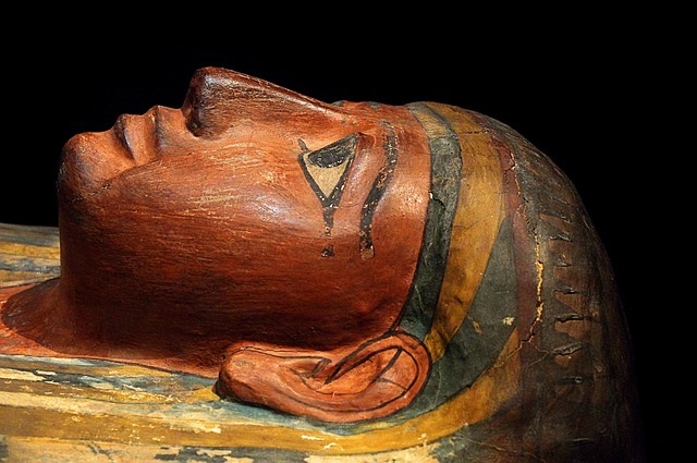2300 years old mummified boy adorned with 49 protective amulets and a golden mask