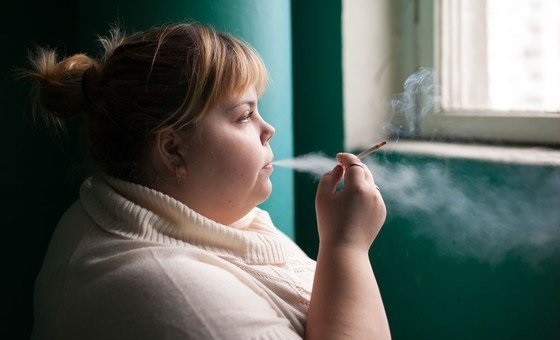 Photo of an obesed smoker