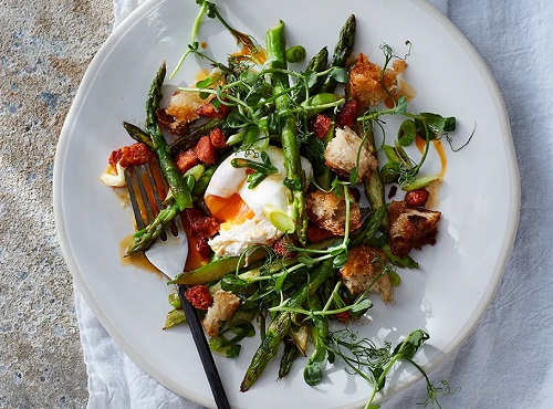 Photo of Butter Roast Asparagus with Poached Eggs & Chorizo made fromChorizo, fresh organic eggs and new season asparagus – a trio made even better when served with crispy chunks of sourdough too. 