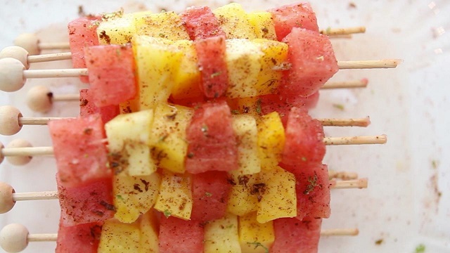 Photo of freshly Grilled Fruit Skewers with Chile-Lime Salt and Baby Fruit Cup. Photo credit: Cooking Channel TV